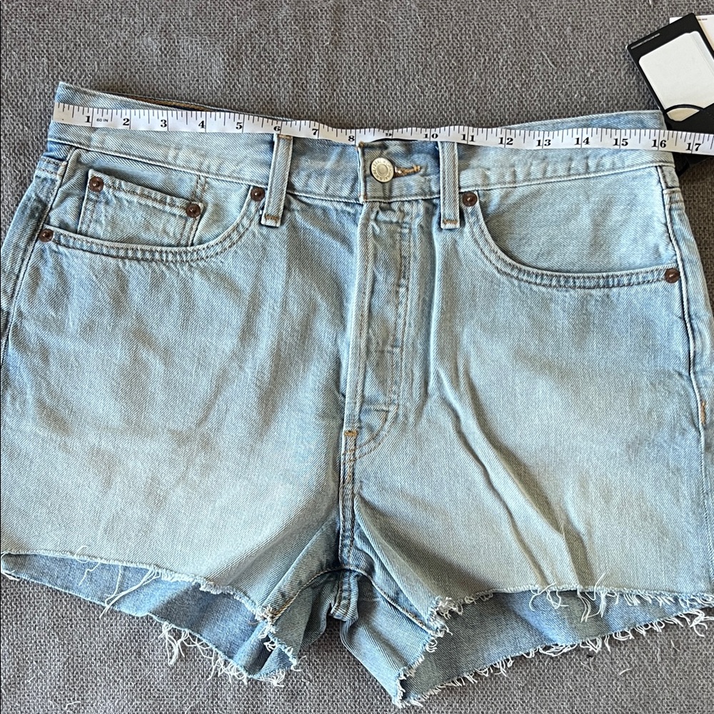 Re/Done Light Wash Denim Cutoff Shorts